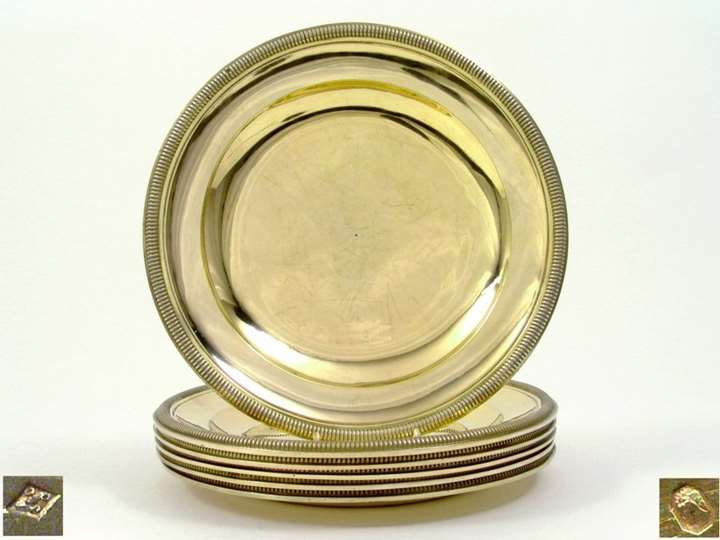 A Set of Six French Silver Gilt Dinner Plates